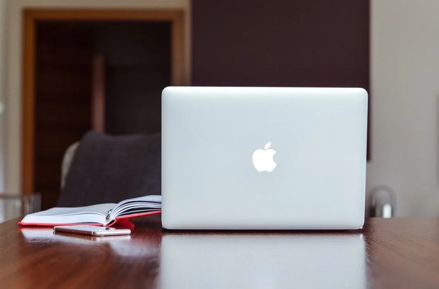 iconic Apple logo on a MacBook
