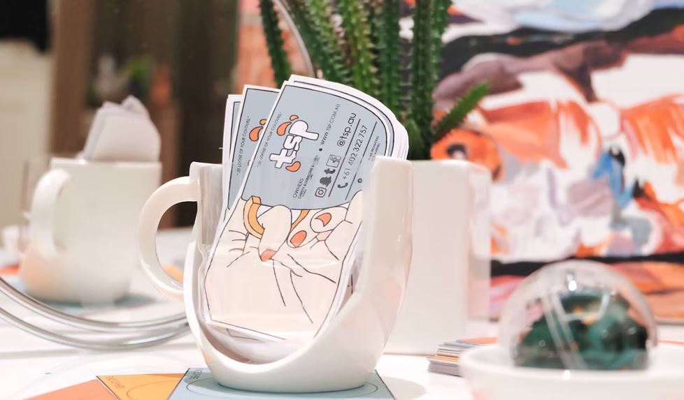 business cards in mug