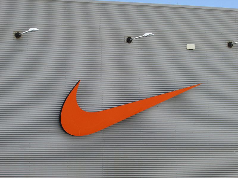 The Nike Swoosh on the exterior of a Nike factory store