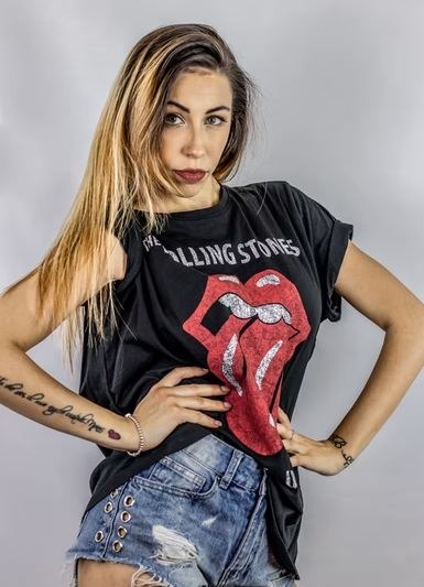 A-woman-wearing-a-shirt-with-the-Rolling-Stones-logo