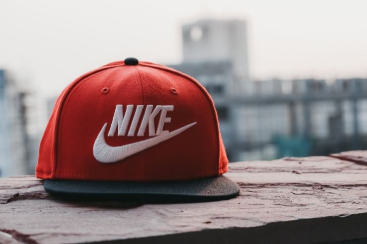 Red-and-black-Nike-fitted-cap-on-a-wall